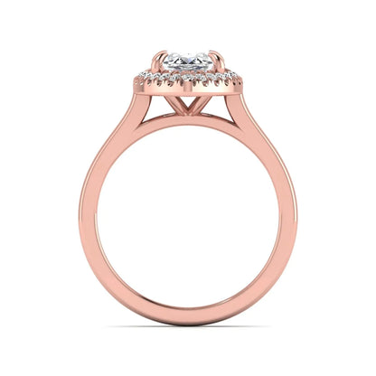 Marquise cut lab grown diamond halo engagement ring with round accent diamonds in a classic prong halo setting in rose gold