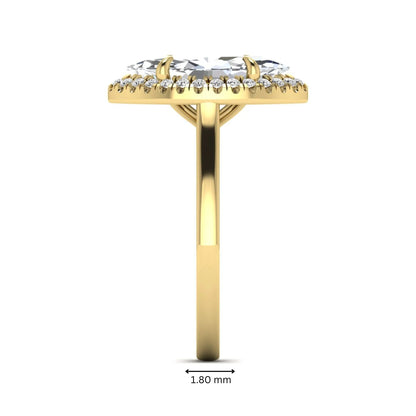 Marquise cut lab grown diamond halo engagement ring with round accent diamonds in a classic prong halo setting in yellow gold