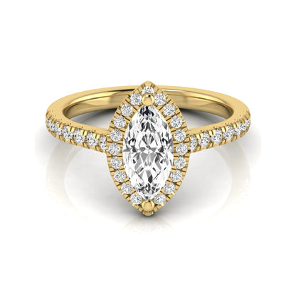 Marquise cut lab grown diamond engagement ring featuring a round diamond halo, pavé diamond band, and classic prong setting with a polished yellow gold tone band.
