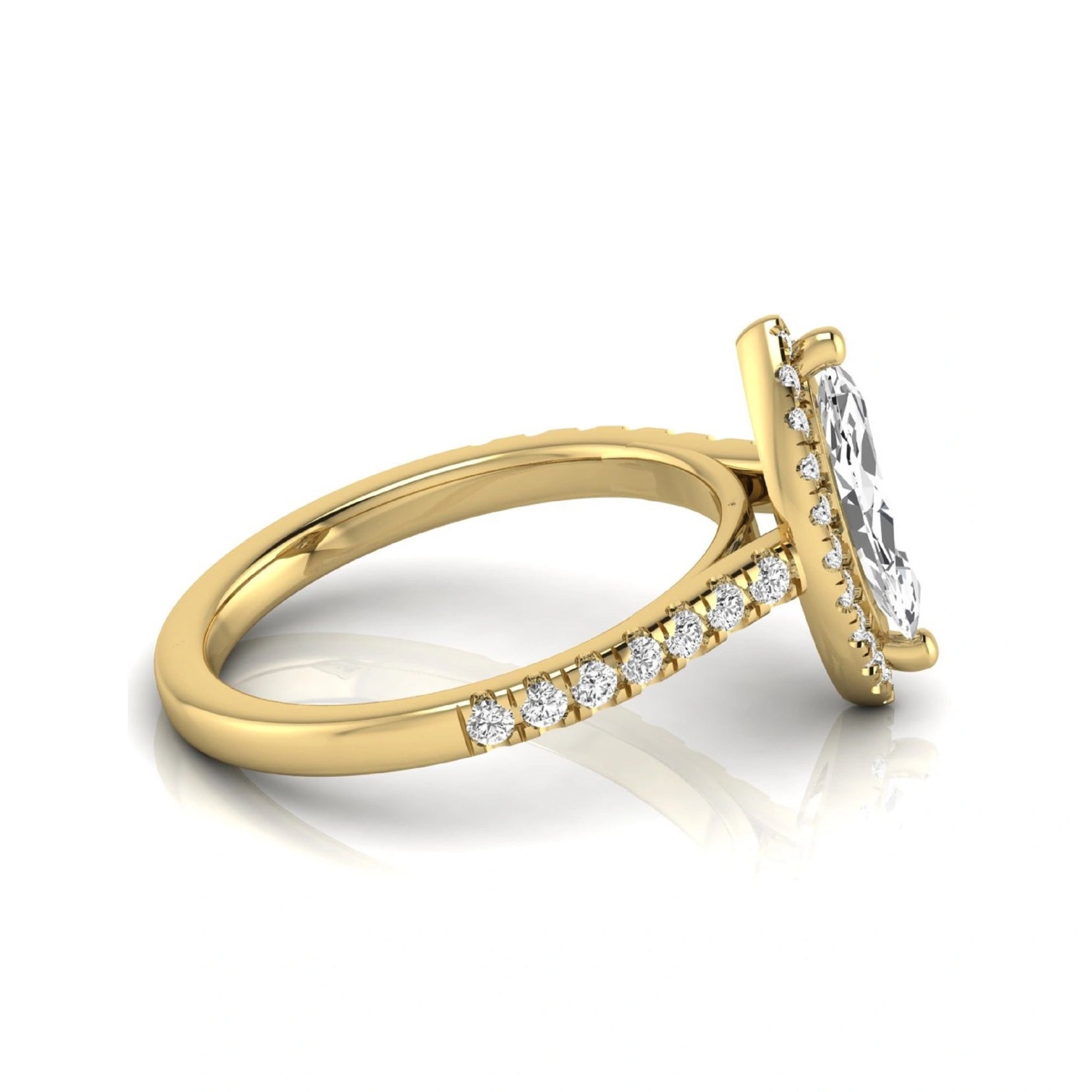 Marquise cut lab grown diamond engagement ring featuring a round diamond halo, pavé diamond band, and classic prong setting with a polished yellow gold tone band.