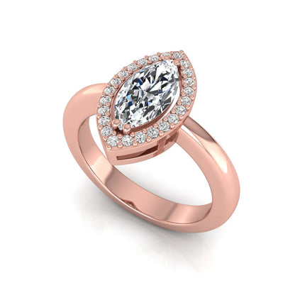 Marquise halo lab grown diamond engagement ring featuring a marquise cut center diamond surrounded by a round diamond halo in Rose gold.