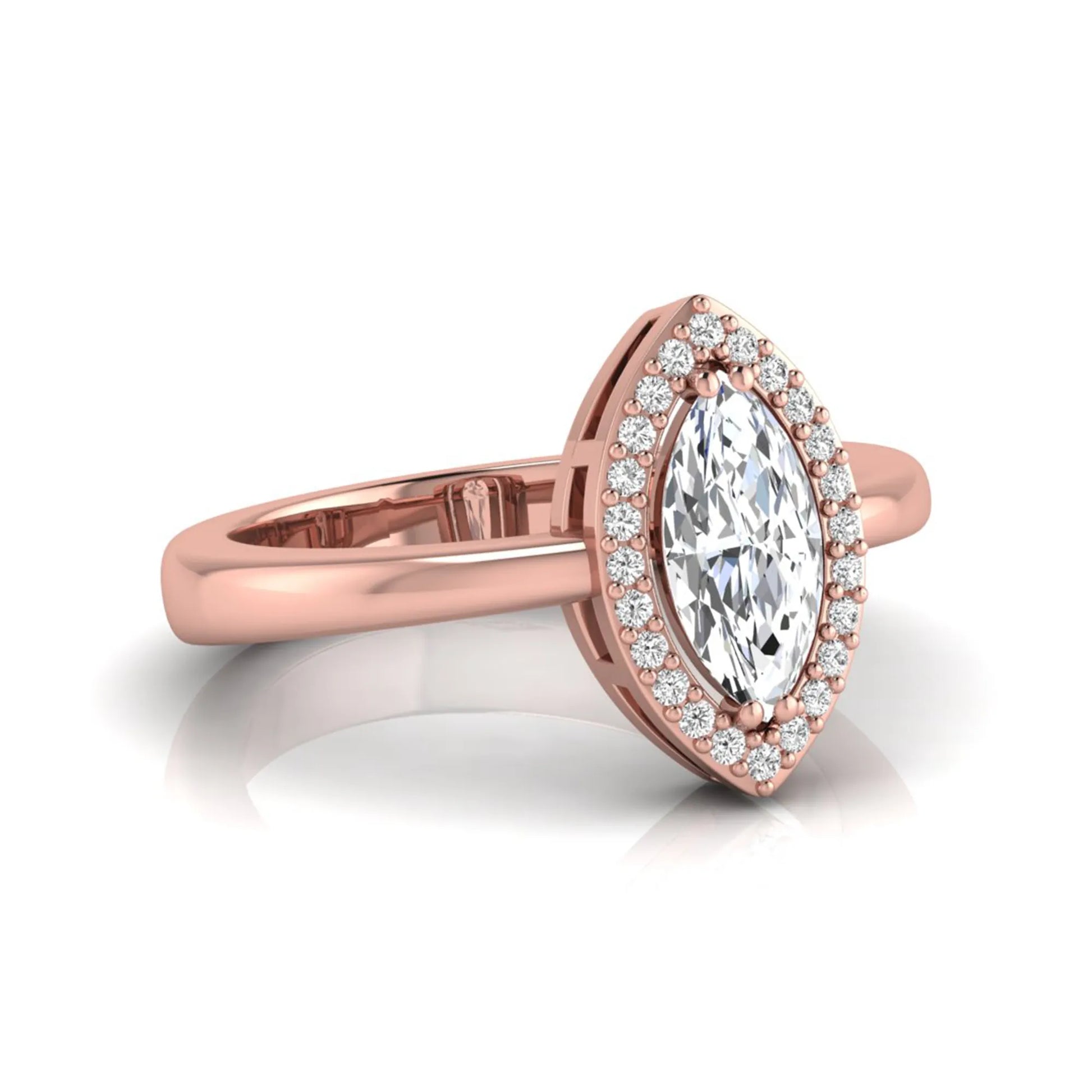 Marquise halo lab grown diamond engagement ring featuring a marquise cut center diamond surrounded by a round diamond halo in Rose gold.