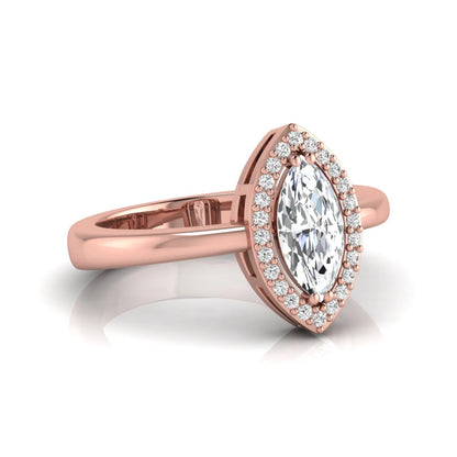 Marquise halo lab grown diamond engagement ring featuring a marquise cut center diamond surrounded by a round diamond halo in Rose gold.