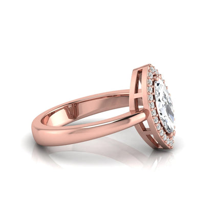 Marquise halo lab grown diamond engagement ring featuring a marquise cut center diamond surrounded by a round diamond halo in Rose gold.