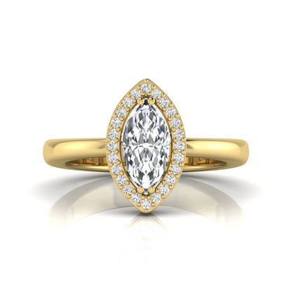 Marquise halo lab grown diamond engagement ring featuring a marquise cut center diamond surrounded by a round diamond halo in yellow gold.