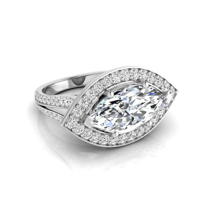 white-gold Diamond ring with a pear-shaped center stone on a white background