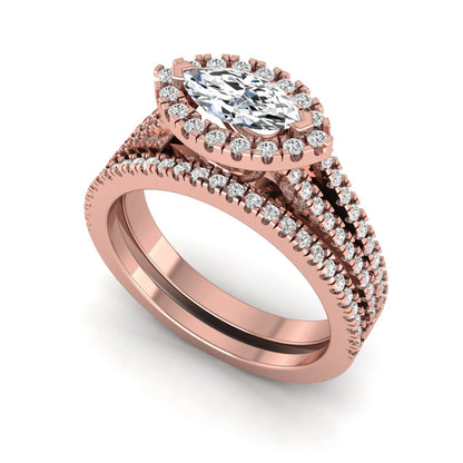 Marquise cut lab grown diamond halo engagement ring set with split shank design and matching pavé diamond wedding band in rose gold.