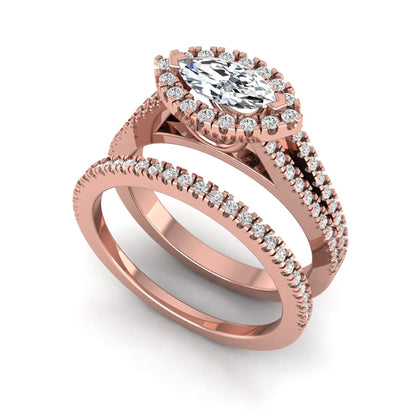 Marquise cut lab grown diamond halo engagement ring set with split shank design and matching pavé diamond wedding band in rose gold.