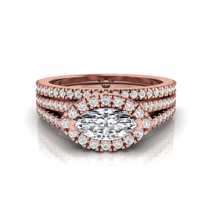 Marquise cut lab grown diamond halo engagement ring set with split shank design and matching pavé diamond wedding band in rose gold.