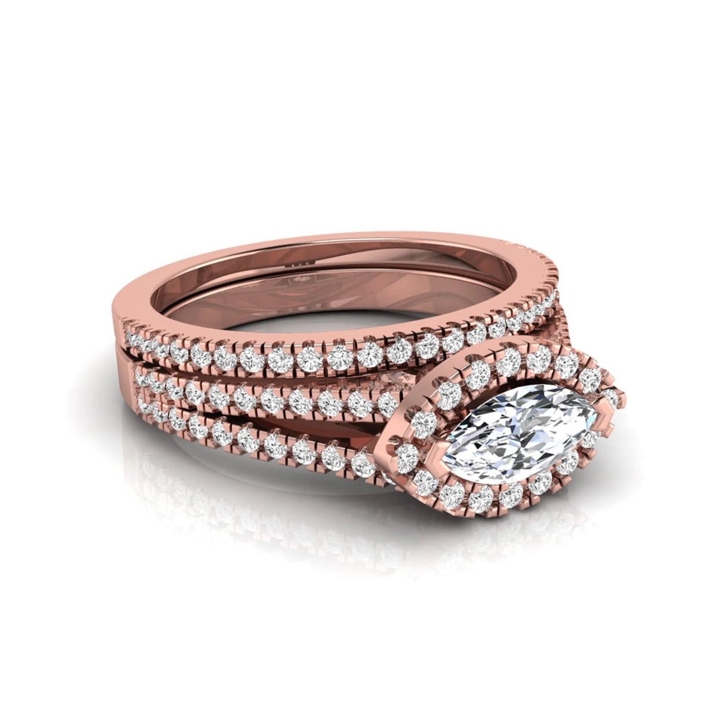Marquise cut lab grown diamond halo engagement ring set with split shank design and matching pavé diamond wedding band in rose gold.