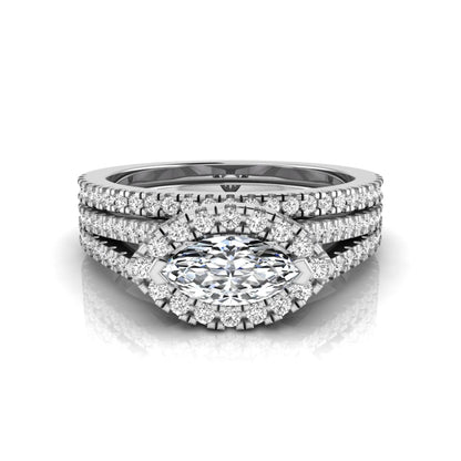 Marquise cut lab grown diamond halo engagement ring set with split shank design and matching pavé diamond wedding band in white gold.