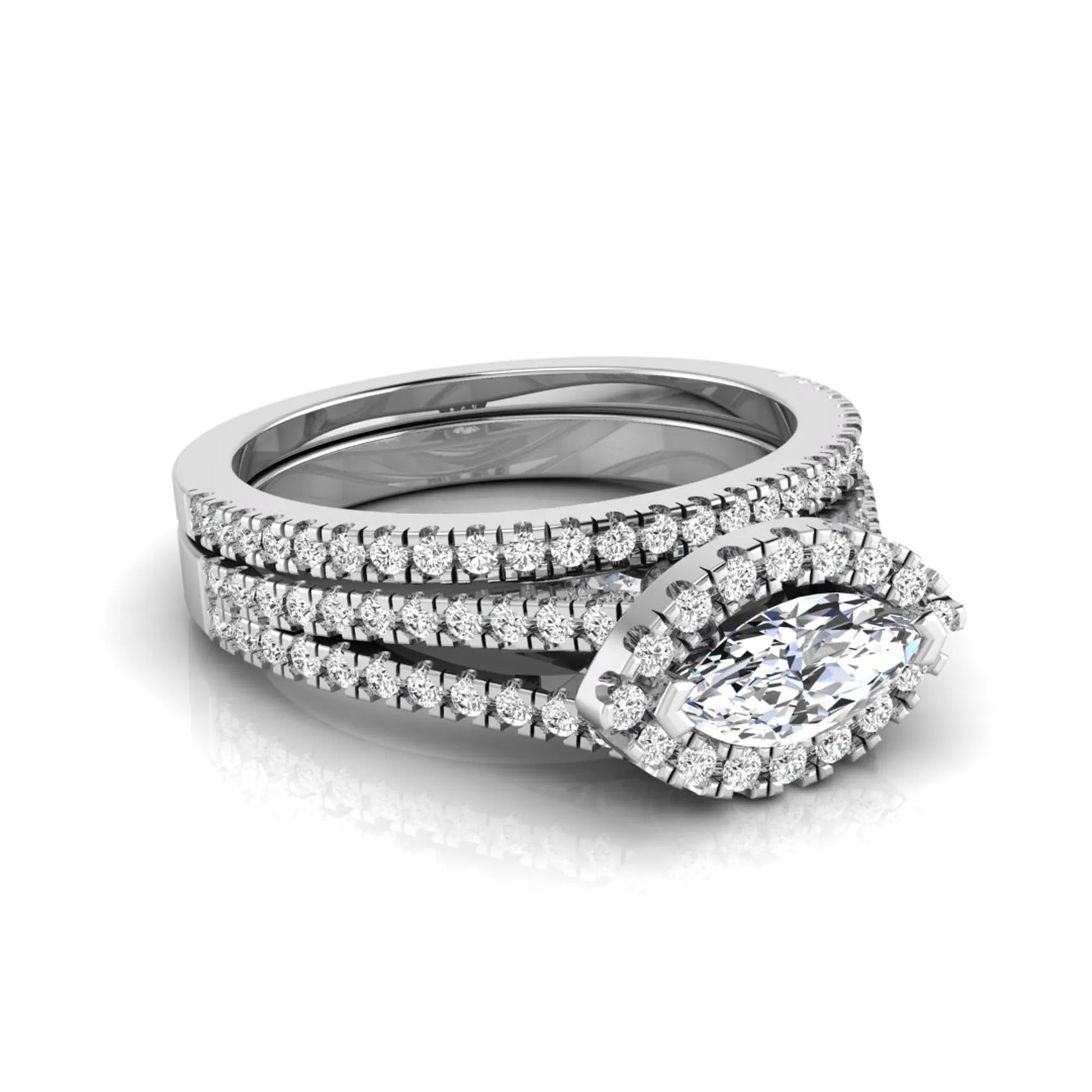 Marquise cut lab grown diamond halo engagement ring set with split shank design and matching pavé diamond wedding band in white gold.