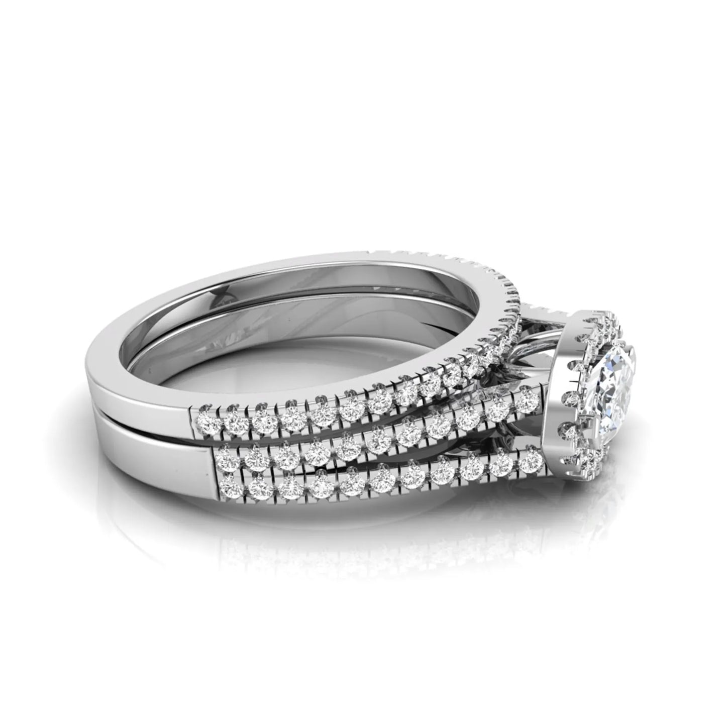 Marquise cut lab grown diamond halo engagement ring set with split shank design and matching pavé diamond wedding band in white gold.