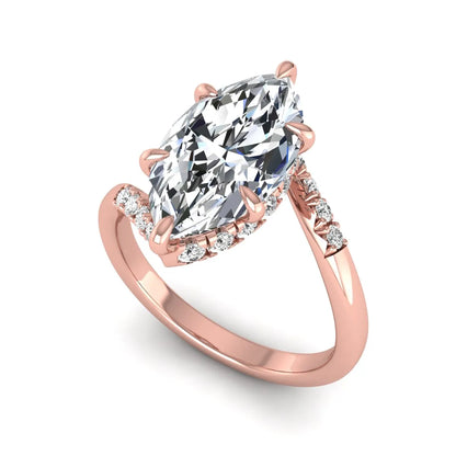 Marquise cut lab grown diamond engagement ring featuring a hidden halo, bypass shank, prong setting, and round accent diamonds in a rose gold tone design.