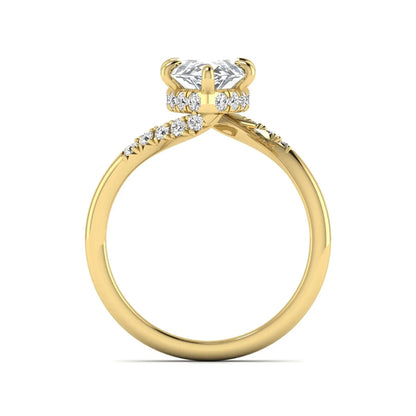 Marquise cut lab grown diamond engagement ring featuring a hidden halo, bypass shank, prong setting, and round accent diamonds in a yellow gold tone design.
