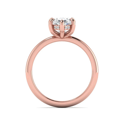 Marquise cut lab grown diamond solitaire engagement ring featuring a hidden halo, six-prong setting, and polished rose gold tone band.