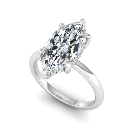 Marquise cut lab grown diamond solitaire engagement ring featuring a hidden halo, six-prong setting, and polished white gold tone band.