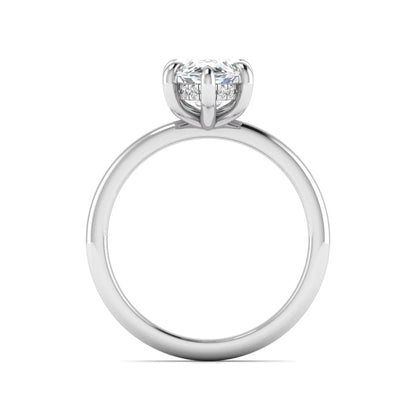 Marquise cut lab grown diamond solitaire engagement ring featuring a hidden halo, six-prong setting, and polished white gold tone band.