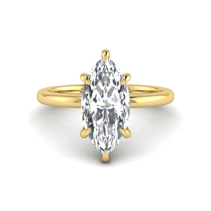 Marquise cut lab grown diamond solitaire engagement ring featuring a hidden halo, six-prong setting, and polished yellow gold tone band.