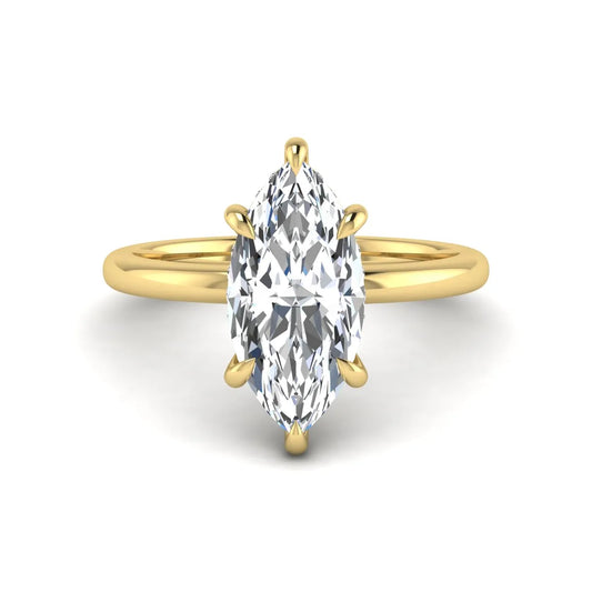 Marquise cut lab grown diamond solitaire engagement ring featuring a hidden halo, six-prong setting, and polished yellow gold tone band.
