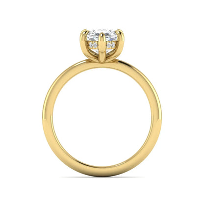 Marquise cut lab grown diamond solitaire engagement ring featuring a hidden halo, six-prong setting, and polished yellow gold tone band.