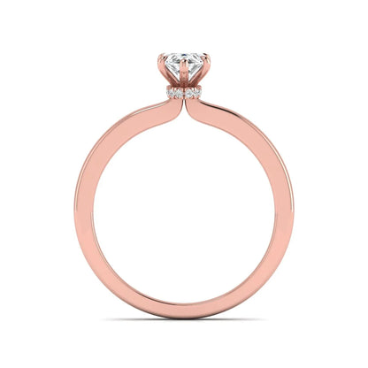 IGI Certified 1.10 carat marquise cut lab grown diamond solitaire engagement ring with hidden halo in rose gold.