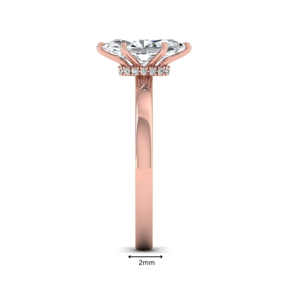 IGI Certified 1.10 carat marquise cut lab grown diamond solitaire engagement ring with hidden halo in rose gold.