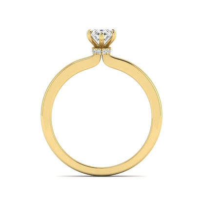 IGI Certified 1.10 carat marquise cut lab grown diamond solitaire engagement ring with hidden halo in yellow gold.