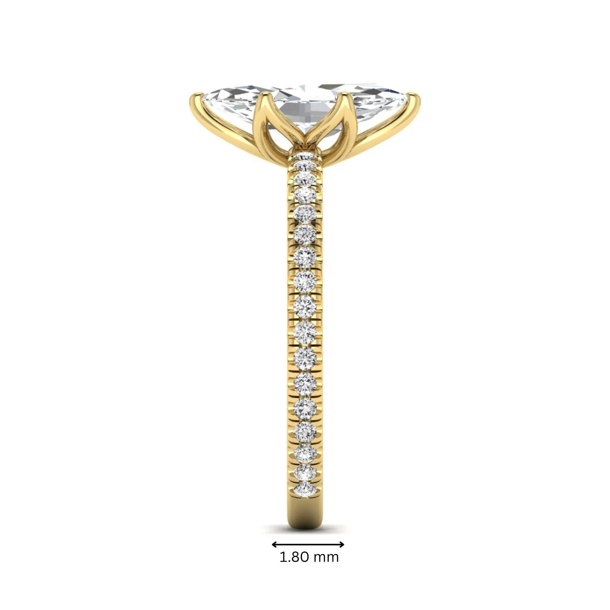 Marquise cut lab grown diamond engagement ring with an IGI certified center diamond and pavé round diamond band in yellow gold.