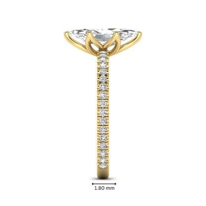 Marquise cut lab grown diamond engagement ring with an IGI certified center diamond and pavé round diamond band in yellow gold.