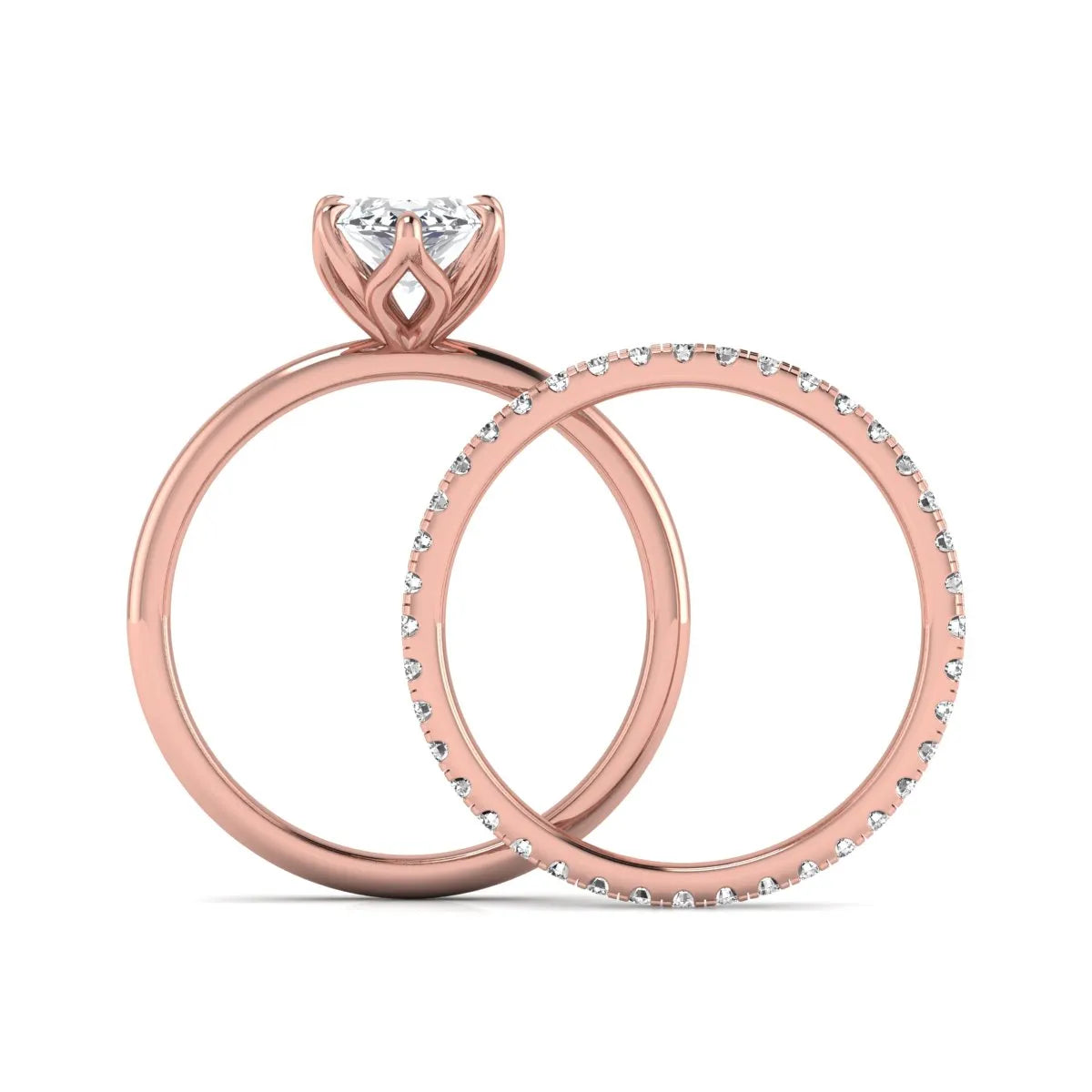 IGI Certified 2.11 carat marquise cut lab grown diamond engagement ring set with matching round diamond wedding band in rose gold.