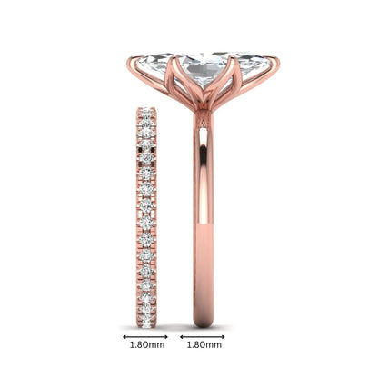 IGI Certified 2.11 carat marquise cut lab grown diamond engagement ring set with matching round diamond wedding band in rose gold.