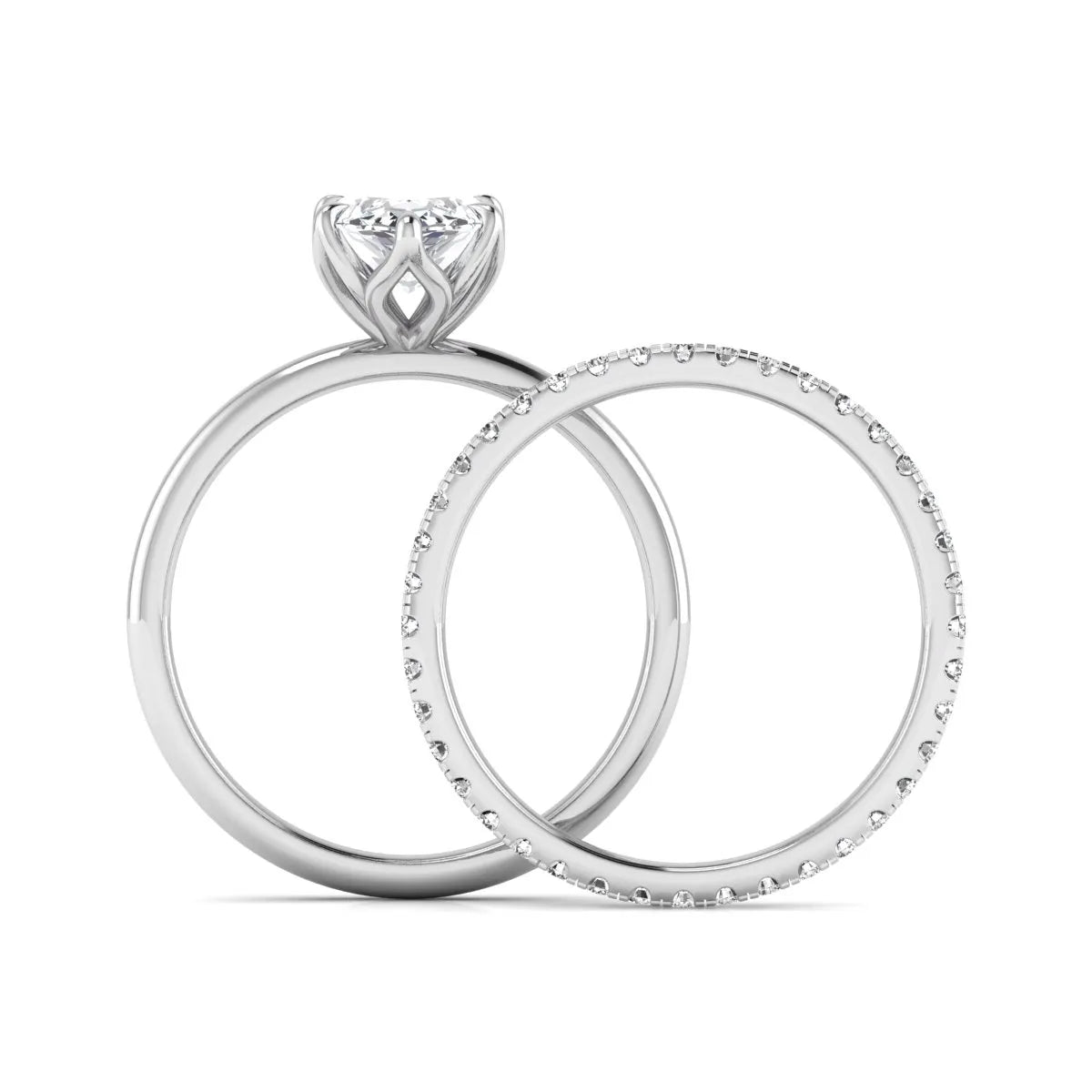 IGI Certified 2.11 carat marquise cut lab grown diamond engagement ring set with matching round diamond wedding band in white gold.