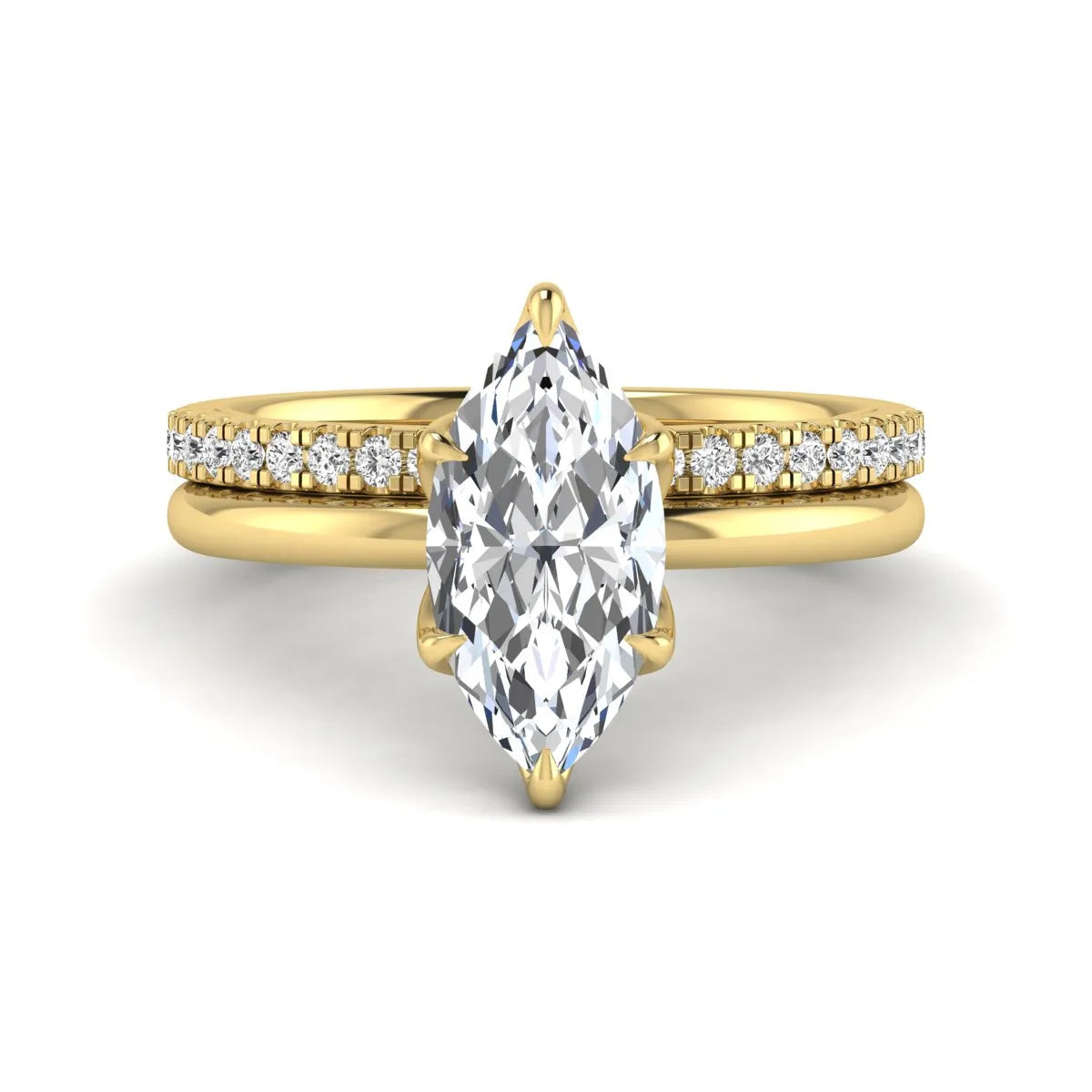 IGI Certified 2.11 carat marquise cut lab grown diamond engagement ring set with matching round diamond wedding band in yellow gold.