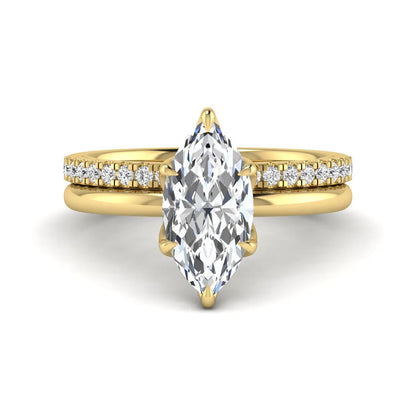 IGI Certified 2.11 carat marquise cut lab grown diamond engagement ring set with matching round diamond wedding band in yellow gold.