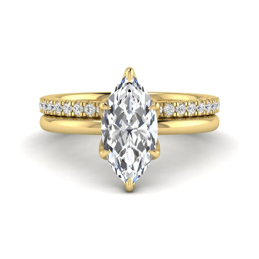 IGI Certified 2.11 carat marquise cut lab grown diamond engagement ring set with matching round diamond wedding band in yellow gold.