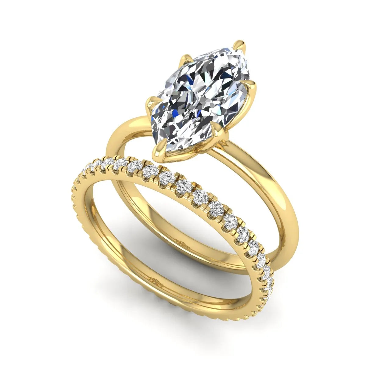 IGI Certified 2.11 carat marquise cut lab grown diamond engagement ring set with matching round diamond wedding band in yellow gold.