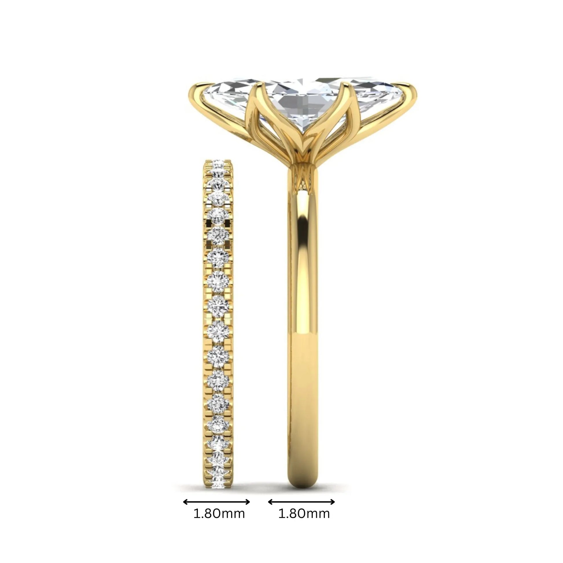 IGI Certified 2.11 carat marquise cut lab grown diamond engagement ring set with matching round diamond wedding band in yellow gold.