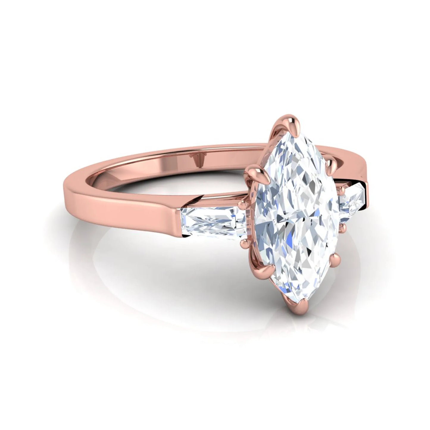 Marquise cut lab grown diamond engagement ring featuring a 0.95 carat IGI certified center diamond with baguette side diamonds in a rose gold three stone setting.
