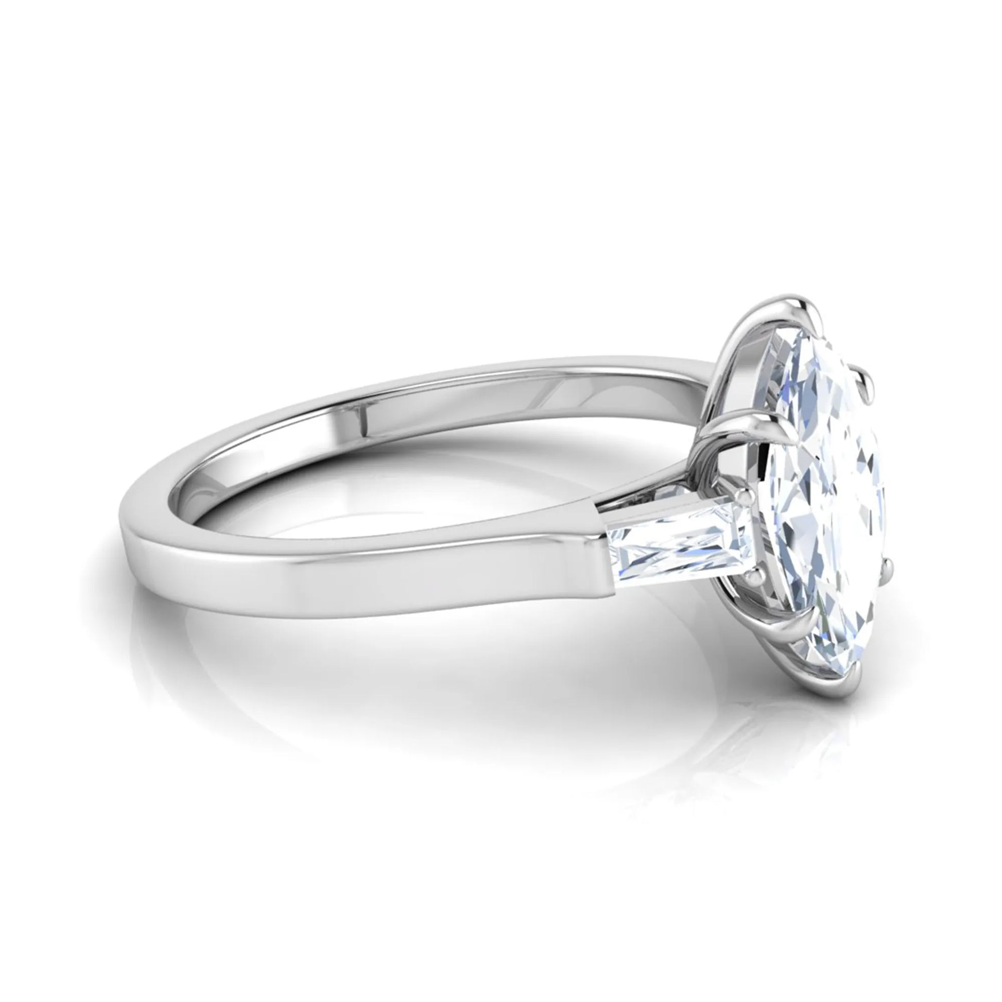 Marquise cut lab grown diamond engagement ring featuring a 0.95 carat IGI certified center diamond with baguette side diamonds in a white gold three stone setting.