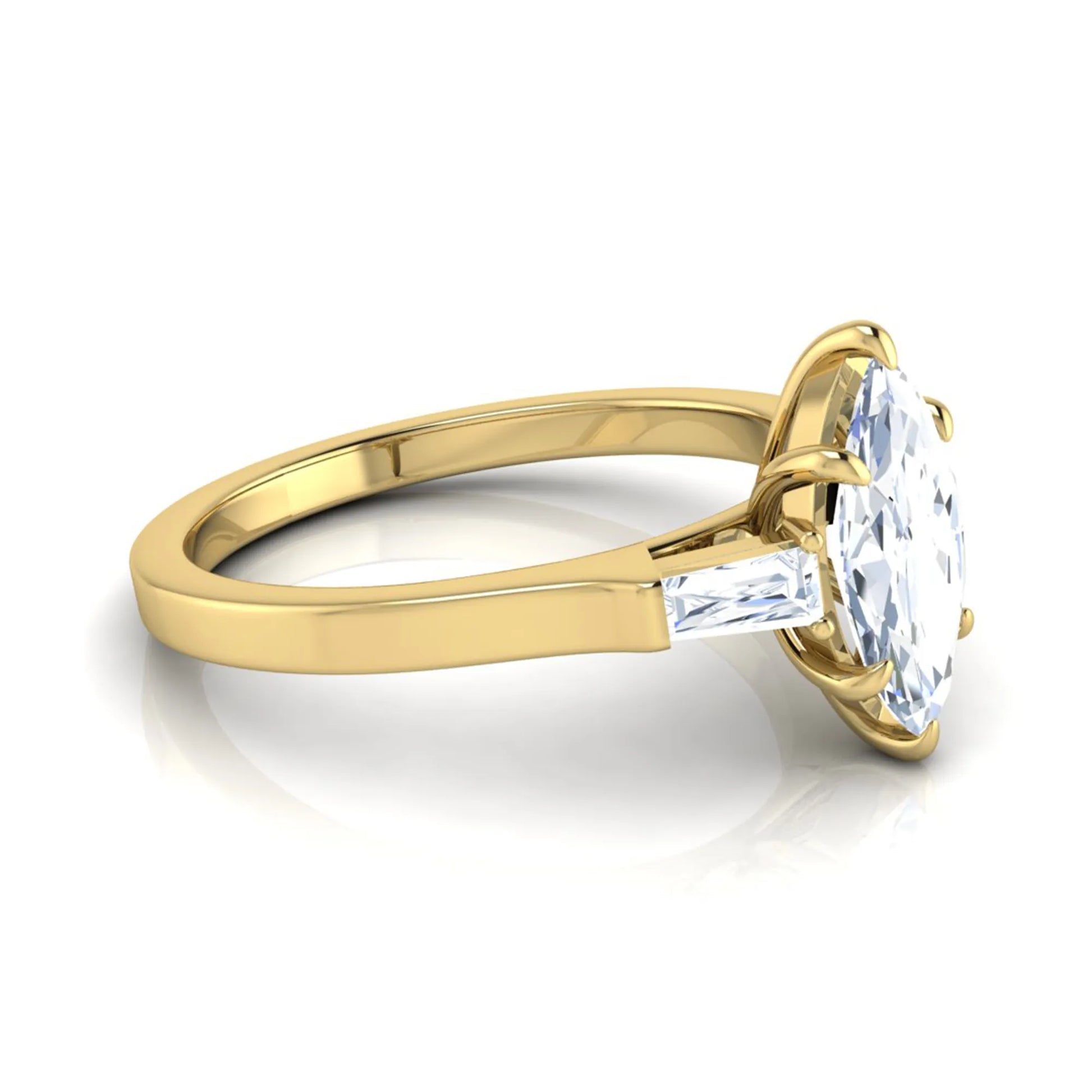 Marquise cut lab grown diamond engagement ring featuring a 0.95 carat IGI certified center diamond with baguette side diamonds in a yellow gold three stone setting.
