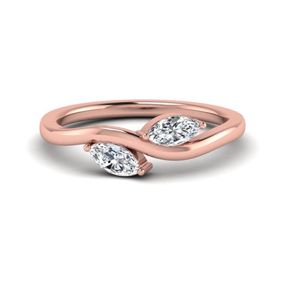 Nature-inspired marquise cut lab grown diamond leaf ring with two marquise diamonds on a gracefully curved polished band in rose gold