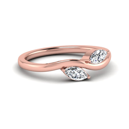 Nature-inspired marquise cut lab grown diamond leaf ring with two marquise diamonds on a gracefully curved polished band in rose gold