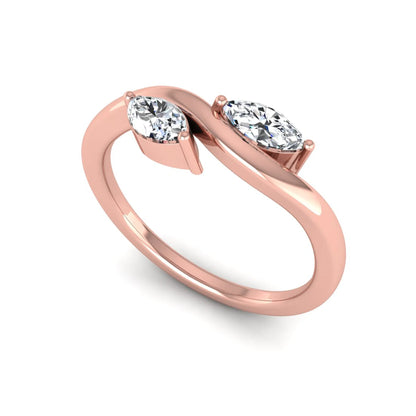 Nature-inspired marquise cut lab grown diamond leaf ring with two marquise diamonds on a gracefully curved polished band in rose gold
