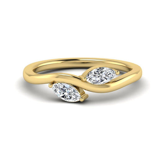 Nature-inspired marquise cut lab grown diamond leaf ring with two marquise diamonds on a gracefully curved polished band in yellow gold