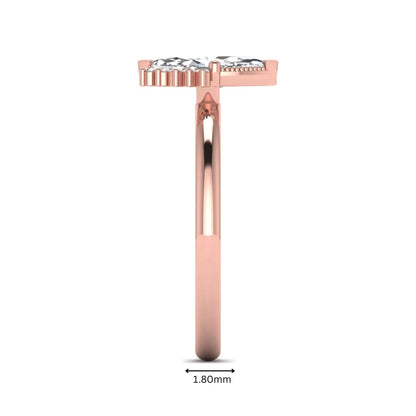 Marquise North-South Accent Lab Grown Diamond Engagement Ring featuring a marquise-cut center diamond with round diamond accents in a prong setting in rose gold