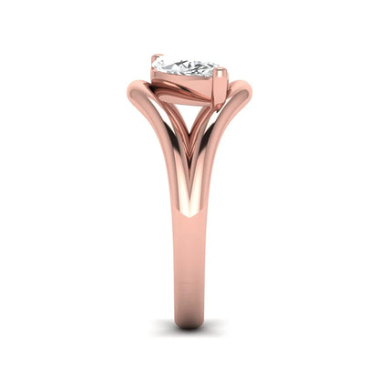 Marquise cut lab grown diamond open frame solitaire engagement ring in a rose gold sculptural setting
