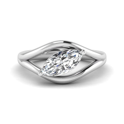 Marquise cut lab grown diamond open frame solitaire engagement ring in a white gold sculptural setting