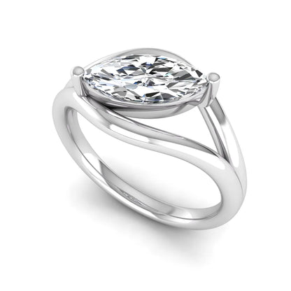 Marquise cut lab grown diamond open frame solitaire engagement ring in a white gold sculptural setting