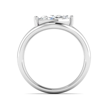 Marquise cut lab grown diamond open frame solitaire engagement ring in a white gold sculptural setting
